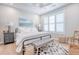 Inviting bedroom with a ceiling fan, natural light, and stylish decor and furnishings at 260 Seven Farms Dr # 306, Charleston, SC 29492
