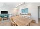 Comfortable dining area with modern lighting, stylish decor, and an open layout at 260 Seven Farms Dr # 306, Charleston, SC 29492