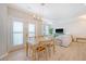 Open-concept living space with dining area, living room, and natural light at 260 Seven Farms Dr # 306, Charleston, SC 29492