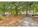 Picturesque community park with mature trees, picnic tables, benches, and well maintained landscaping at 260 Seven Farms Dr # 306, Charleston, SC 29492