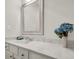 Bathroom vanity featuring granite countertop and decorative framed mirror at 2720 Oak Manor Dr, Mount Pleasant, SC 29466