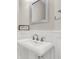 Clean, white bathroom with modern fixtures and wainscoting at 2720 Oak Manor Dr, Mount Pleasant, SC 29466