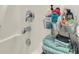 Bathtub featuring chrome fixtures and caddy full of bath products at 2720 Oak Manor Dr, Mount Pleasant, SC 29466