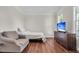 Bedroom with comfortable seating area and a mounted TV at 2720 Oak Manor Dr, Mount Pleasant, SC 29466