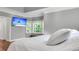 Bright bedroom featuring a TV, bay window, and hardwood floors at 2720 Oak Manor Dr, Mount Pleasant, SC 29466