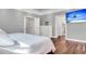 Bright primary bedroom with hardwood floors, featuring a large closet and doorway at 2720 Oak Manor Dr, Mount Pleasant, SC 29466