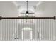 View of the foyer featuring a vaulted ceiling, wood flooring, and white railing at 2720 Oak Manor Dr, Mount Pleasant, SC 29466