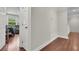 Hallway featuring hardwood flooring and view into adjacent room at 2720 Oak Manor Dr, Mount Pleasant, SC 29466