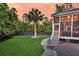 A charming screened porch on the back of the home at 2720 Oak Manor Dr, Mount Pleasant, SC 29466