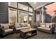 Inviting screened porch with ample seating and open views, blending indoor comfort with outdoor charm at 2720 Oak Manor Dr, Mount Pleasant, SC 29466