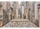 Tiled shower featuring a built-in bench and multiple shower heads at 2720 Oak Manor Dr, Mount Pleasant, SC 29466