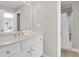 White bathroom with a white vanity and a view of the walk-in shower and bath at 2791 Gaston Gate, Mount Pleasant, SC 29466