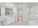 Bright bathroom features marble floors, modern vanity, walk-in shower and access to other rooms in the house at 2791 Gaston Gate, Mount Pleasant, SC 29466