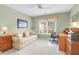 Well-lit bedroom featuring carpeted floors, a ceiling fan, a sofa, a desk, and a window at 2791 Gaston Gate, Mount Pleasant, SC 29466