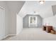 Spacious carpeted bedroom with vaulted ceilings, a ceiling fan, and natural light from a window at 2791 Gaston Gate, Mount Pleasant, SC 29466