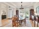 Formal dining room with hardwood floors, large window, rug, and chandelier at 2791 Gaston Gate, Mount Pleasant, SC 29466