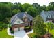 Beautiful brick home with a two-car garage and a well-maintained lawn at 2791 Gaston Gate, Mount Pleasant, SC 29466