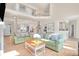 Living room featuring high ceilings, a fireplace, and access to other living areas at 2791 Gaston Gate, Mount Pleasant, SC 29466