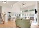 Spacious living room with hardwood floors, fireplace, and ample natural light at 2791 Gaston Gate, Mount Pleasant, SC 29466