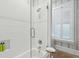 Bathroom boasts tiled walls, a glass-enclosed shower, and charming decorative accents at 28 Robert Mills Cir, Mount Pleasant, SC 29464