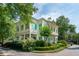 Southern-style home with a double porch, columns, and lush landscaping at 28 Robert Mills Cir, Mount Pleasant, SC 29464