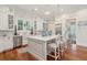 Bright, contemporary kitchen with large center island, white cabinets, and modern appliances for culinary enthusiasts at 28 Robert Mills Cir, Mount Pleasant, SC 29464