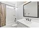 Bathroom featuring subway tile shower, updated fixtures, and bright vanity with a large mirror at 2828 Wagner Way, Mount Pleasant, SC 29466