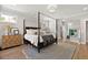 Spacious main bedroom showcasing natural light, elegant decor, and hardwood flooring throughout at 2828 Wagner Way, Mount Pleasant, SC 29466