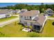 A beautiful two-story home features a patio and screened in porch, perfect for outdoor entertaining and relaxation at 2828 Wagner Way, Mount Pleasant, SC 29466
