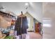 Attic features shelving, window, and lots of room for storage at 29 Smith St, Charleston, SC 29401