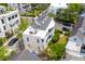 Exterior view of the residence highlighting its ample outdoor area including a wraparound porch and meticulously kept lawn at 29 Smith St, Charleston, SC 29401