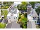 Captivating aerial shot of a classic home with a generous wraparound porch and a verdant, well-maintained yard at 29 Smith St, Charleston, SC 29401