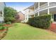 A well-manicured lawn and landscaping complements this charming home at 29 Smith St, Charleston, SC 29401