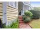 Charming entrance featuring brick steps and a beautiful porch at 29 Smith St, Charleston, SC 29401