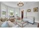 Spacious living room featuring large windows that flood the room with natural light at 29 Smith St, Charleston, SC 29401