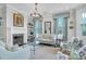 Bright and airy living room with fireplace and bay windows, perfect for entertaining at 29 Smith St, Charleston, SC 29401