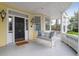 Charming porch featuring a bench with cushions, offering a welcoming spot to relax at 29 Smith St, Charleston, SC 29401
