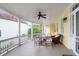 Inviting porch with comfortable seating and a ceiling fan, perfect for outdoor relaxation at 29 Smith St, Charleston, SC 29401
