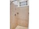 Modern tiled shower with adjustable shower head and convenient corner shelves at 29 Smith St, Charleston, SC 29401