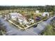This aerial view showcases a community gathering space with shaded pergolas and vibrant landscaping at 312 Greenhouse, Summerville, SC 29485