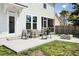 A backyard featuring a patio set, an outdoor fireplace and an open door to the house at 312 Greenhouse, Summerville, SC 29485