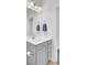Bright bathroom featuring light gray vanity, modern fixtures, and a spacious mirror reflecting the room at 312 Greenhouse, Summerville, SC 29485