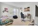 Bright bedroom with colorful accents, a comfy bed, and a functional workspace for studying and creativity at 312 Greenhouse, Summerville, SC 29485