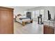 Sunlit bedroom with king bed, wood floors, exercise sauna, and large windows providing plenty of natural light at 312 Greenhouse, Summerville, SC 29485