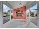 View of the community sign with outdoor seating and a welcoming message for residents at 312 Greenhouse, Summerville, SC 29485