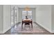 Bright dining area featuring a stylish table set and a colorful rug adding warmth to the space at 312 Greenhouse, Summerville, SC 29485