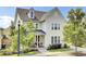 Inviting home with a classic design, featuring a well-maintained lawn and covered porch at 312 Greenhouse, Summerville, SC 29485