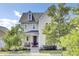 Charming two-story home featuring manicured landscaping and a welcoming front porch perfect for relaxing at 312 Greenhouse, Summerville, SC 29485