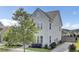A beautiful home showcasing well-kept landscaping and a long private driveway at 312 Greenhouse, Summerville, SC 29485