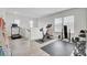 Upstairs home gym featuring treadmill, exercise bike, free weights, and rubber floor creating an inspiring workout area at 312 Greenhouse, Summerville, SC 29485